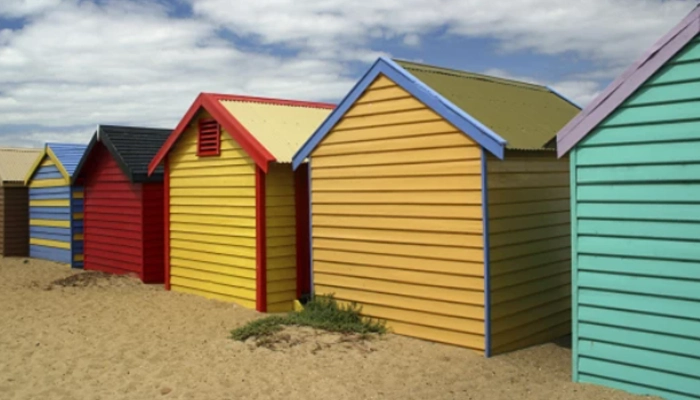 Secure multi coloured beach huts