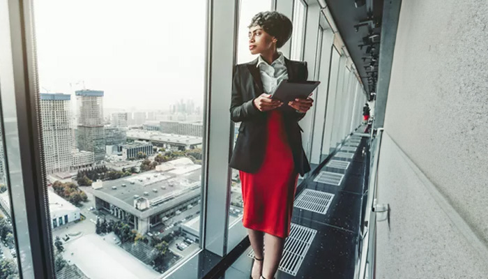 Businesswoman Looking Out Over City 2