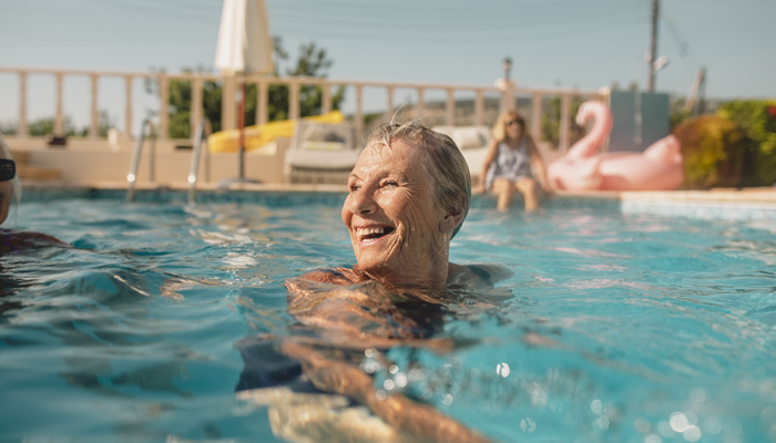 Women Enjoying Swimming In Holiday Home Pool