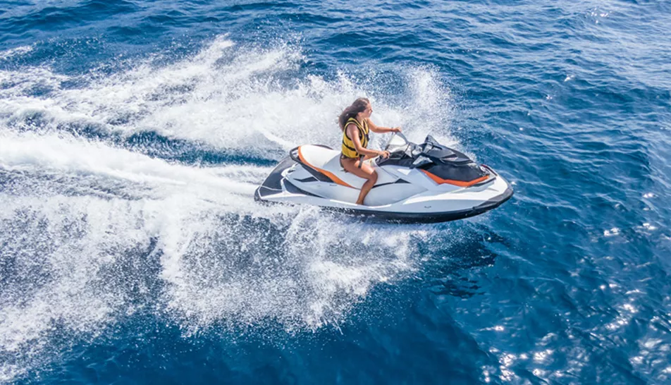 woman riding jetski in the sea