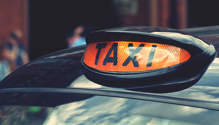 Taxi With Sign