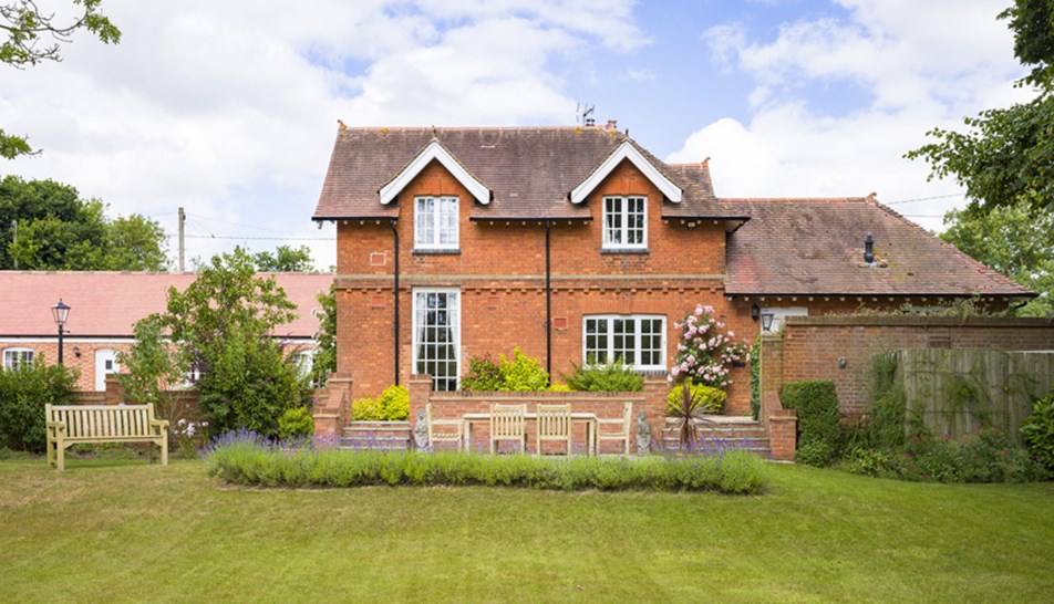 Exterior of large house and lawn