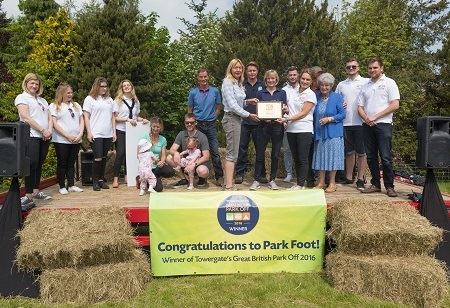 The Park Foot team are presented with their winner's plaque by representatives of Towergate's Cheltenham office