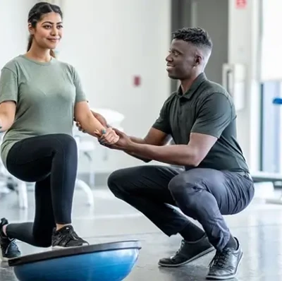 Sports Therapist And Patient Sports Therapist And Patient