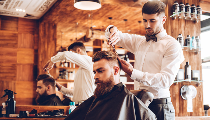 Hairdresser Working In Salon