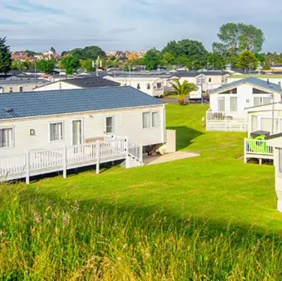 Grass field with static caravans 