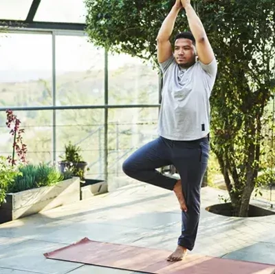 Man Doing Tree Pose (1) Man Doing Tree Pose (1)