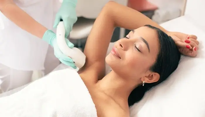 Woman Undergoing Laser Hair Removal Treatment